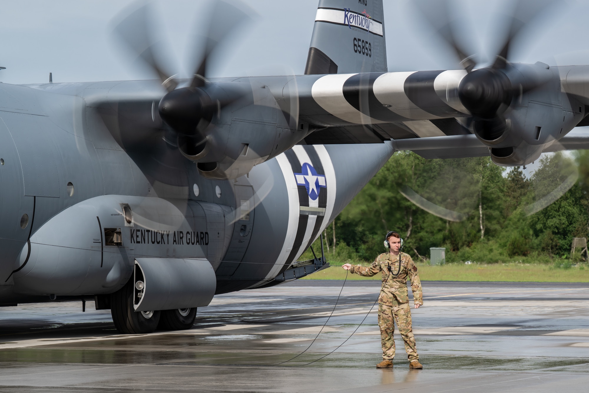 U.S. Air Force Airman Staff Sgt. Charles Vincent, a loadmaster assigned to the 123rd Airlift Wing, Kentucky Air National Guard, prepares to board a C-130J Super Hercules aircraft at Karup Air Base, Denmark, June 8, 2026, for a training mission in Norway. The 123rd AW is providing tactical airlift support to NATO Allies throughout the month of June in support of Ramstein Flag 2026, an Allied Air Command large-scale, multi-location and joint operating area exercise with 18 participating nations and more than 200 aircraft. (U.S. Air National Guard photo by Lt. Col. Dale Greer)