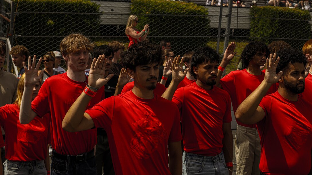 Marines from Recruiting Station Harrisburg and India Battery 3rd Battalion, 14th Marines out of Allentown, Pennsylvania. attended swear in ceremony at Pocono Raceway at Long Pond, Pennsylvania June 14, 2026. New Poolees from all branches had the opportunity to swear in and watch the race. The Pennsylvania Poconos Raceway is where NASCAR races are held in the Northeastern region. (U.S. Marine Corps photo by Sgt. Marcel Gorka)