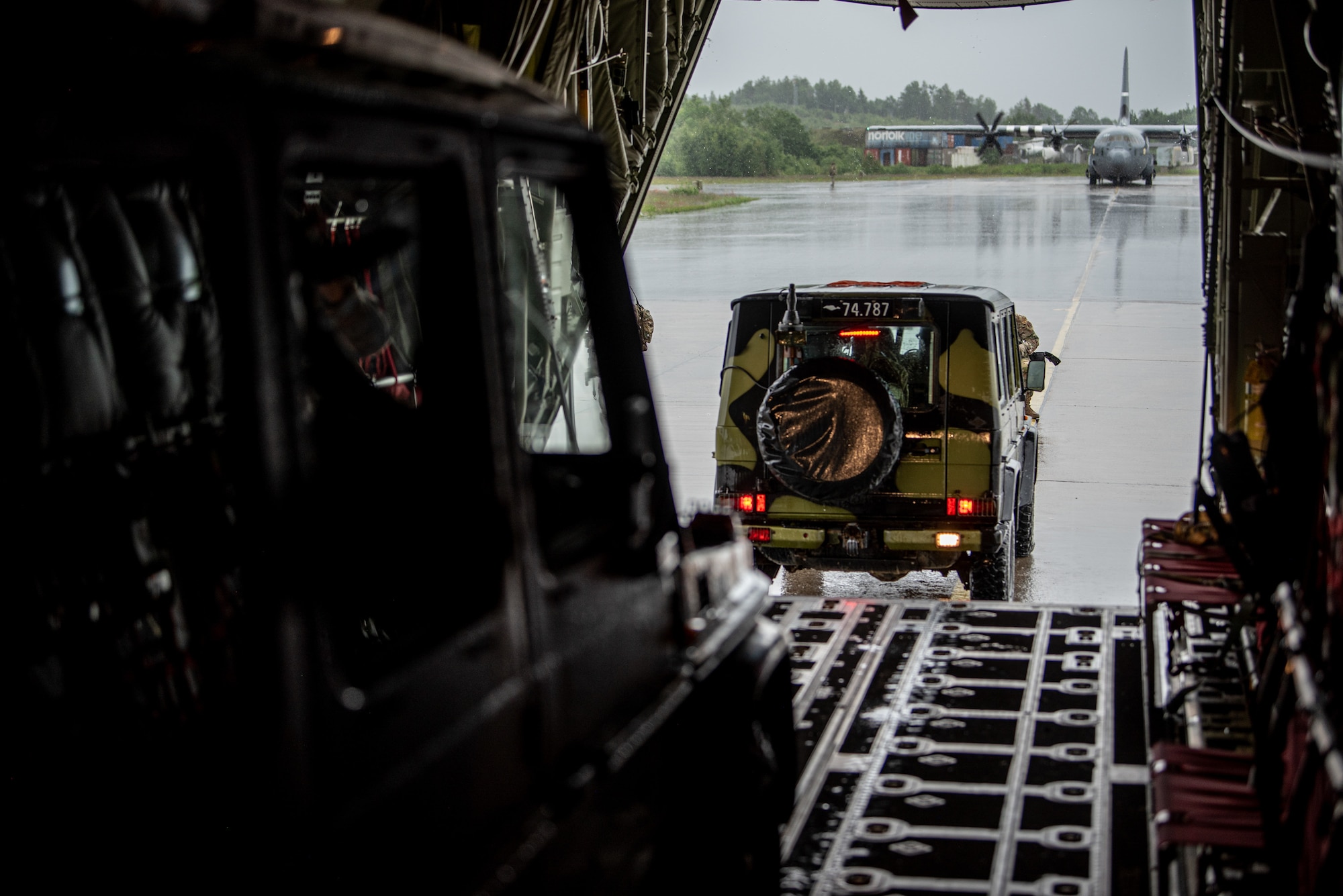Members of the Danish Armed Forces load vehicles onto a U.S. Air Force C-130J Super Hercules aircraft assigned to the 123rd Airlift Wing, Kentucky Air National Guard, at Rygge Air Station, Norway, June 9, 2026, during a search-and-recovery training scenario. The 123rd AW is providing tactical airlift to NATO Allies throughout the month of June in support of Ramstein Flag 2026, an Allied Air Command large-scale, multi-location and joint operating area exercise with 18 participating nations and more than 200 aircraft. (U.S. Air National Guard photo by Master Sgt. Joshua Horton)