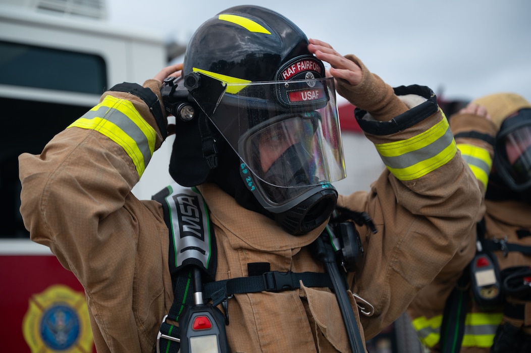 U.S. Air Force firefighter prepares for an emergency response operation exercise at the Louis F. Garland Department of War Fire Academy, Goodfellow Air Force Base, Texas, June 10, 2026.