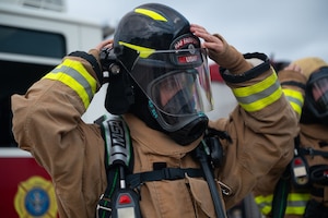 U.S. Air Force firefighter prepares for an emergency response operation exercise at the Louis F. Garland Department of War Fire Academy, Goodfellow Air Force Base, Texas, June 10, 2026.