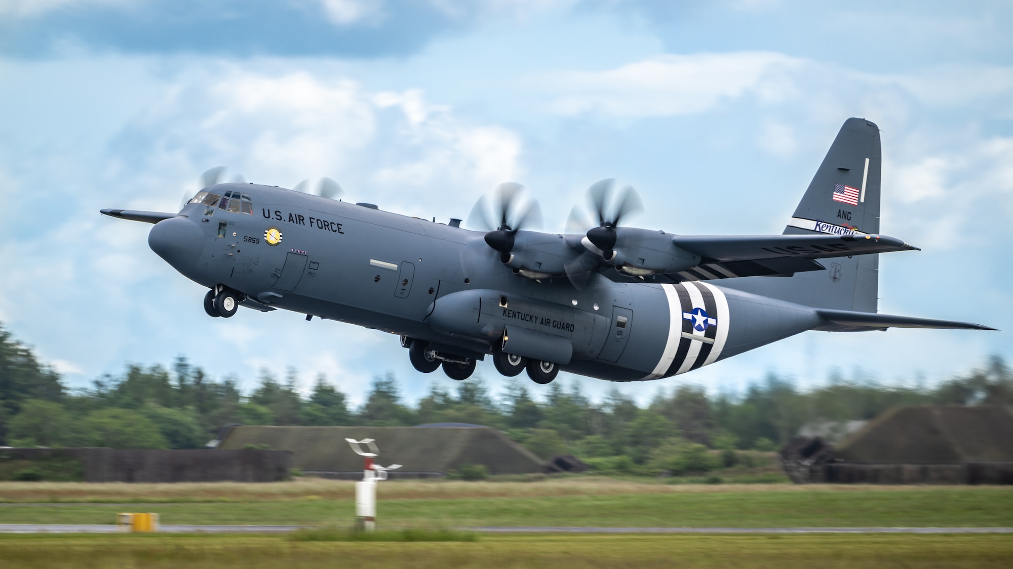 A U.S. Air Force C-130J Super Hercules assigned to the 123rd Airlift Wing, Kentucky Air National Guard, takes off from Karup Air Base, Denmark, June 10, 2026, carrying a Danish Armed Forces Air Mobile Protection and Recovery team as part of a search-and-recovery training scenario. Concurrent with exercise Ramstein Flag 2026, the Air National Guard is conducting bilateral training with Danish Defence forces, enhancing interoperability and showcasing a unified dedication to deterrence. (U.S. Air National Guard photo by Lt. Col. Dale Greer)