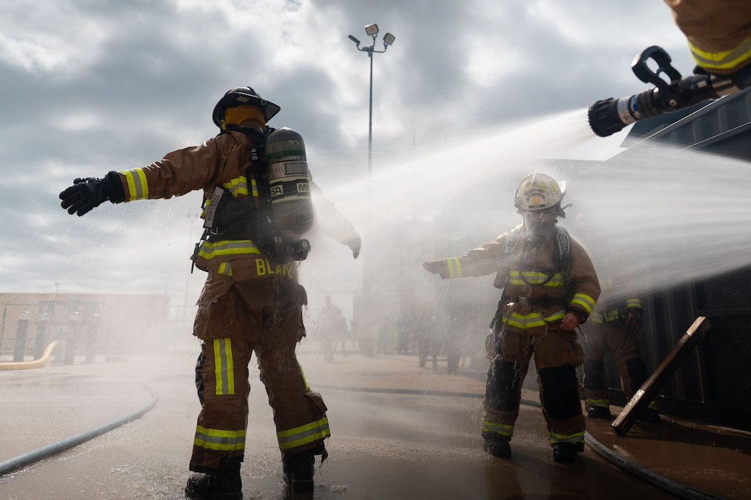 U.S. Air Force firefighter prepares for an emergency response operation exercise at the Louis F. Garland Department of War Fire Academy, Goodfellow Air Force Base, Texas, June 10, 2026.