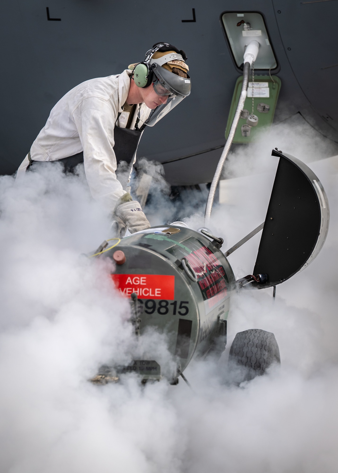 U.S. Air Force Senior Airman Joseph Mitchell, a crew chief assigned to the 123rd Airlift Wing, Kentucky Air National Guard, loads liquid oxygen into a C-130J Super Hercules aircraft at Karup Air Base, Denmark, June 8, 2026. The 123rd AW is providing tactical airlift support to NATO Allies throughout the month of June in support of Ramstein Flag 2026, an Allied Air Command large-scale, multi-location and joint operating area exercise with 18 participating nations and more than 200 aircraft. (U.S. Air National Guard photo by Lt. Col. Dale Greer)