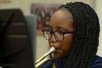 A student plays trumpet.