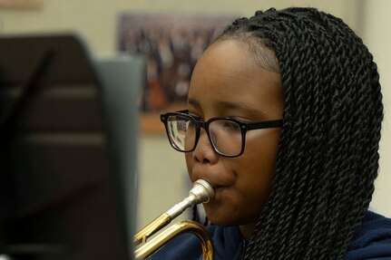 A student plays trumpet.