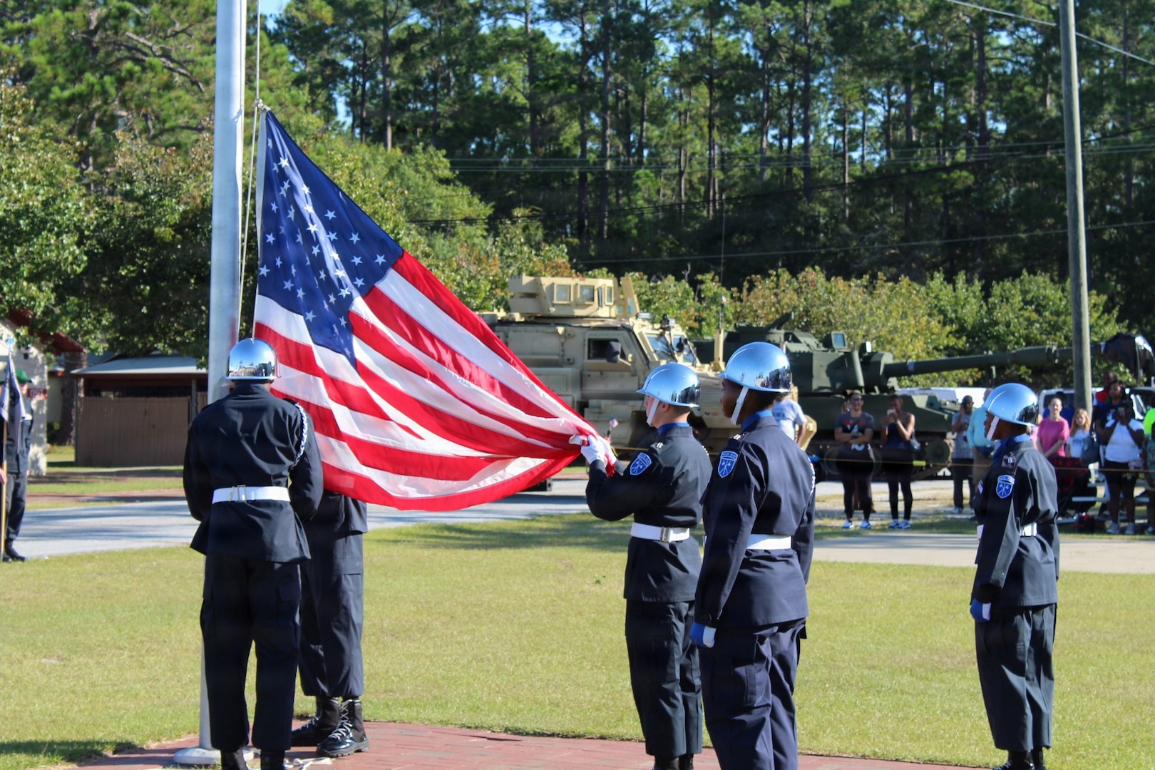 Youth Challenge Academy cadets lower the American flag during a ceremony event Sep. 19, 2025 in Fort Stewart, Ga.