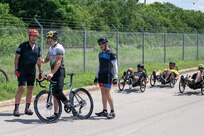 Team Army competitors prepare for a cycling training event during a Warrior Games practice session at Joint Base San Antonio–Fort Sam Houston, Texas, June 10, 2026.
