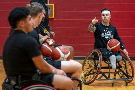 Retired U.S. Army Spc. JP Lane, a former Warrior Games Team Army competitor, provides instruction during wheelchair basketball training at the 2026 Warrior Games Training Camp in San Antonio, Texas, June 10, 2026.