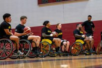 Team Army competitors receive instruction during wheelchair basketball training at the 2026 Warrior Games Training Camp in San Antonio, Texas, June 10, 2026.