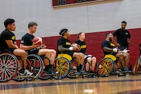 Team Army competitors receive instruction during wheelchair basketball training at the 2026 Warrior Games Training Camp in San Antonio, Texas, June 10, 2026.