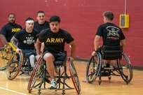 U.S. Army Spc. Adrian Saenz (center) participates in a wheelchair basketball drill during the 2026 Warrior Games Training Camp in San Antonio, Texas, June 10, 2026.