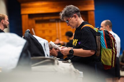 U.S. Army Master Sgt. Jodi Pyle-Vandersys receives competitor gear and equipment issued for the 2026 Warrior Games in San Antonio, Texas, June 10, 2026.