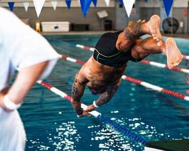 A Team Army competitor dives into the pool during a swimming training session for the 2026 Warrior Games in  San Antonio, Texas, June 10, 2026.