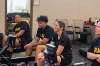 Team Army competitors listen to instruction during indoor rowing training at the 2026 Warrior Games training camp in San Antonio, Texas, June 10, 2026.