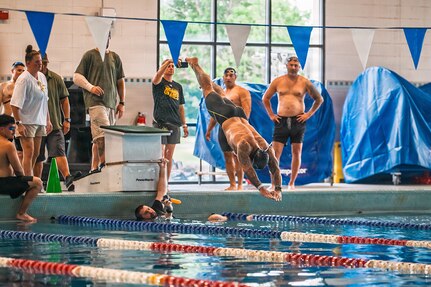 U.S. Army Chief Warrant Officer 3 Jon Tallman works on his starting block technique during a swimming practice session at the 2026 Warrior Games on Joint Base San Antonio, Texas, June 10, 2026.