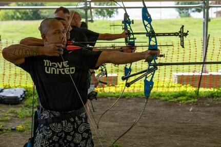 U.S. Army veteran Staff Sgt. Gene Calantoc takes aim at his target during an archery practice session on Joint Base San Antonio-Fort Sam Houston, Texas, June 10, 2026.