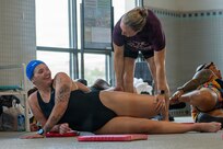 U.S. Army Capt. Vanessa Munro participates in a recovery and mobility session with Krystal Morris, Adaptive Reconditioning Action Officer, during swimming training for the Warrior Games in San Antonio, Texas, June 11, 2026.