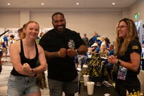 U.S. Army Staff Sgt. Chelsey Scott (left) and Staff Sgt. Daniel Agosto (right) show their competitor spirit at the Warrior Games family program event in San Antonio, Texas, June 12, 2026.