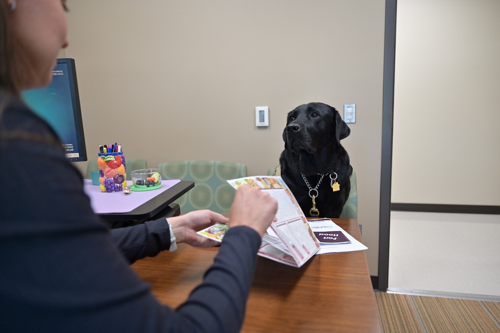 First Lieutenant Stephanie Gay, a registered dietitian with Carl R. Darnall Army Medical Center’s Nutrition Care Division, reviews nutrition education materials with Solomon during his appointment. Patients seen by the Nutrition Care Division receive individualized counseling, practical strategies, and education to help them build healthy habits that fit their lifestyle.