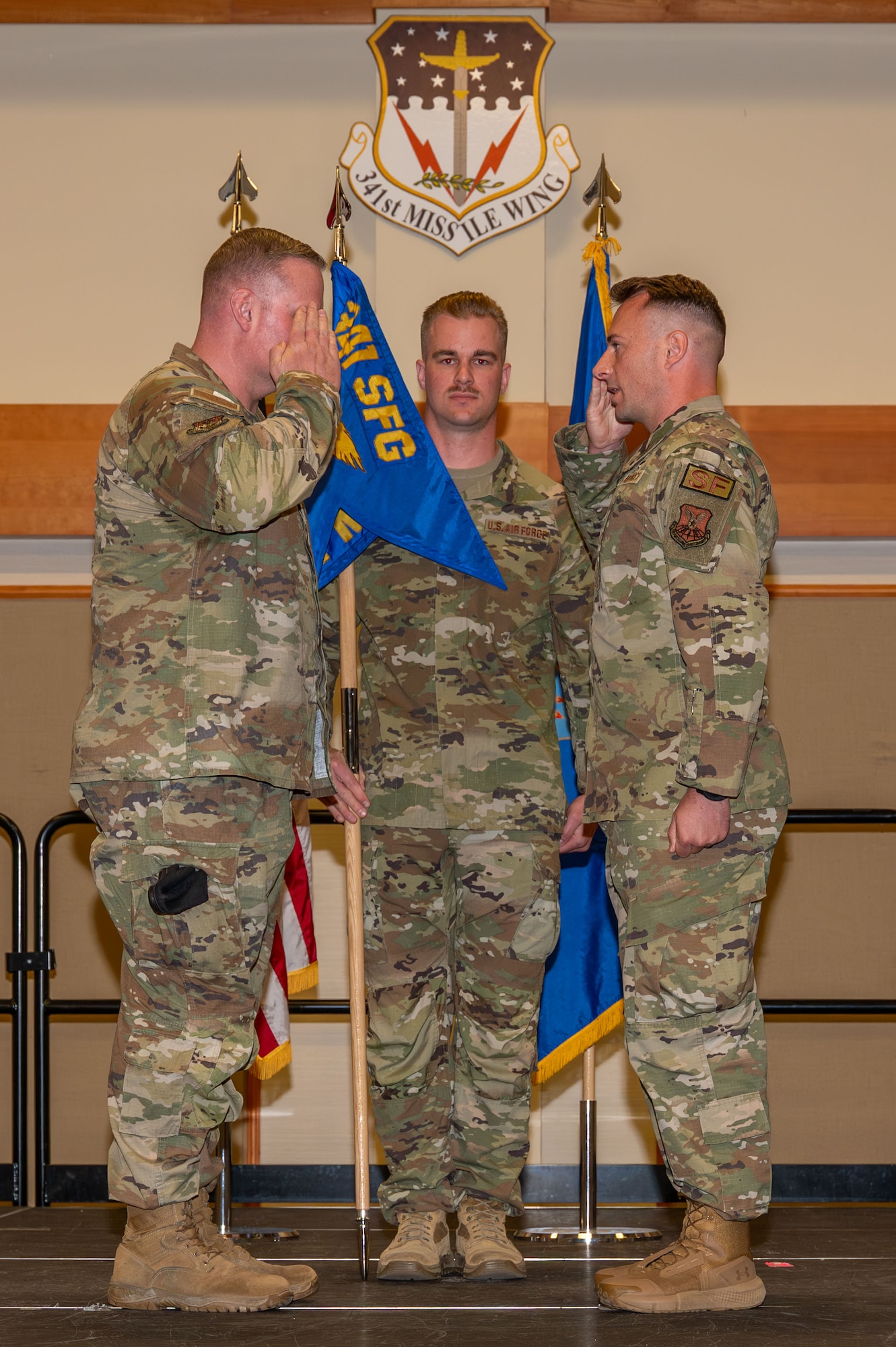 U.S. Air Force Maj. Ricky Sizemore Jr., right, incoming commander of the 741st Missile Security Forces Squadron, salutes Col. Drew Gehler, 341st Security Forces Group commander, during a change of command ceremony at Malmstrom Air Force Base, Montana, June 16, 2026.