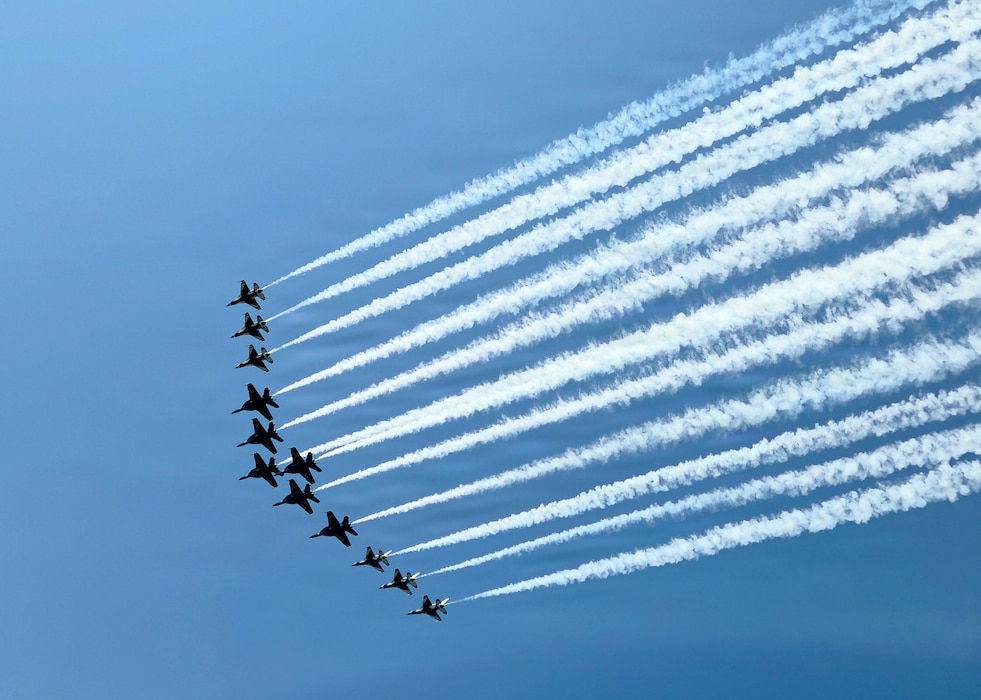 Military aircraft fly over UFC Freedom 250.