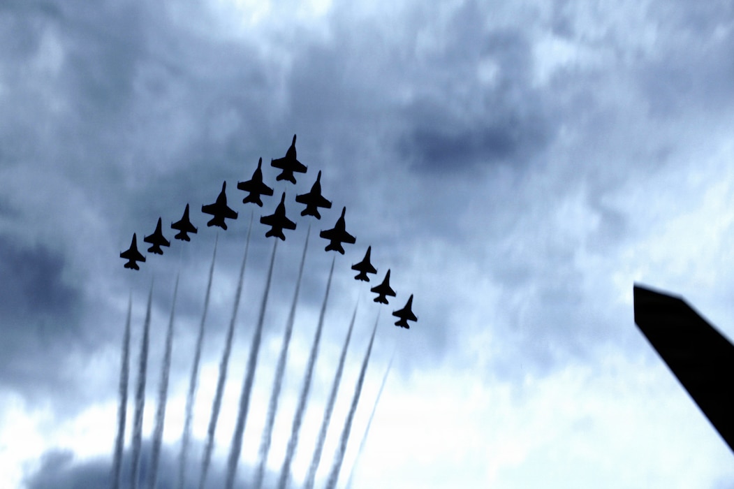 Military aircraft fly over UFC Freedom 250.