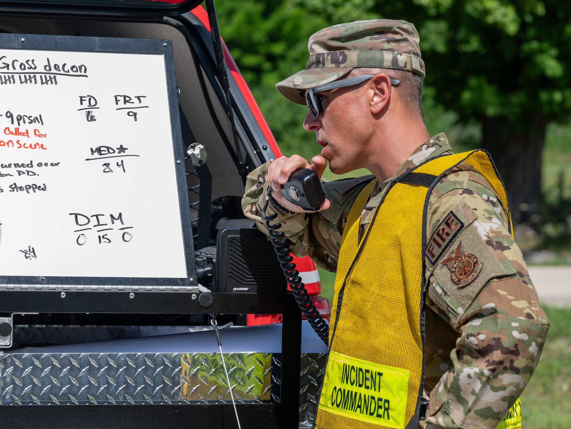 Airman speaks into radio
