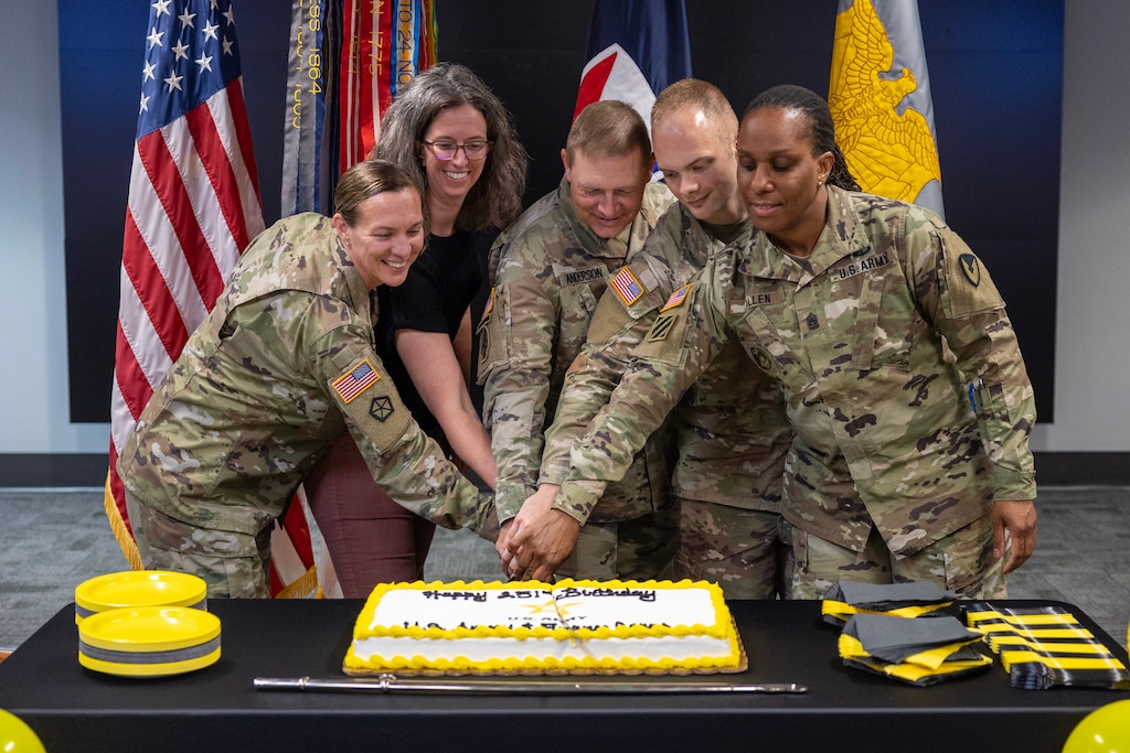 From left to right, Col. Michelle M. Williams, U.S. Army Financial Management Command commander; Denise Gallion, USAFMCOM acting deputy to the commander; Maj. Todd Anderson, USAFMCOM Army Financial Services division chief; 1st Lt. Gunnar Ehlers, 45th Finance Center finance operations officer, cut a cake during a U.S. Army and Army Finance Corps 251st birthday celebration at the Maj. Gen. Emmett J. Bean Federal Center in Indianapolis June 15, 2026. The U.S. Army was established by the Second Continental Congress on June 14, 1775; and just two days later on June 16th, 1775, that same congress established the U.S. Army Finance Corps with creation of the office of Paymaster General, which was first held by James Warren. (U.S. Army photo by Mark R. W. Orders-Woempner)