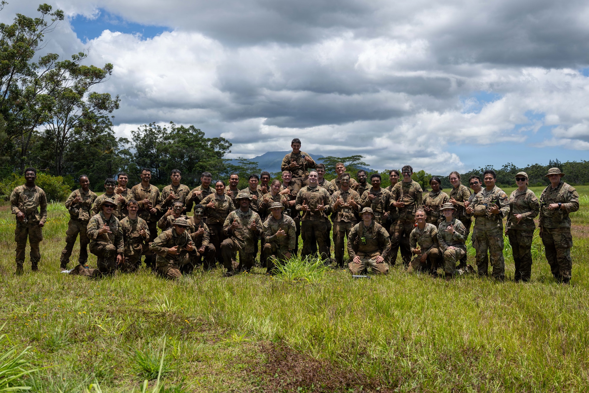 Members of the class of Vanguard Expeditionary Training 02-26 pose for a photo after completing the Green Mile event.