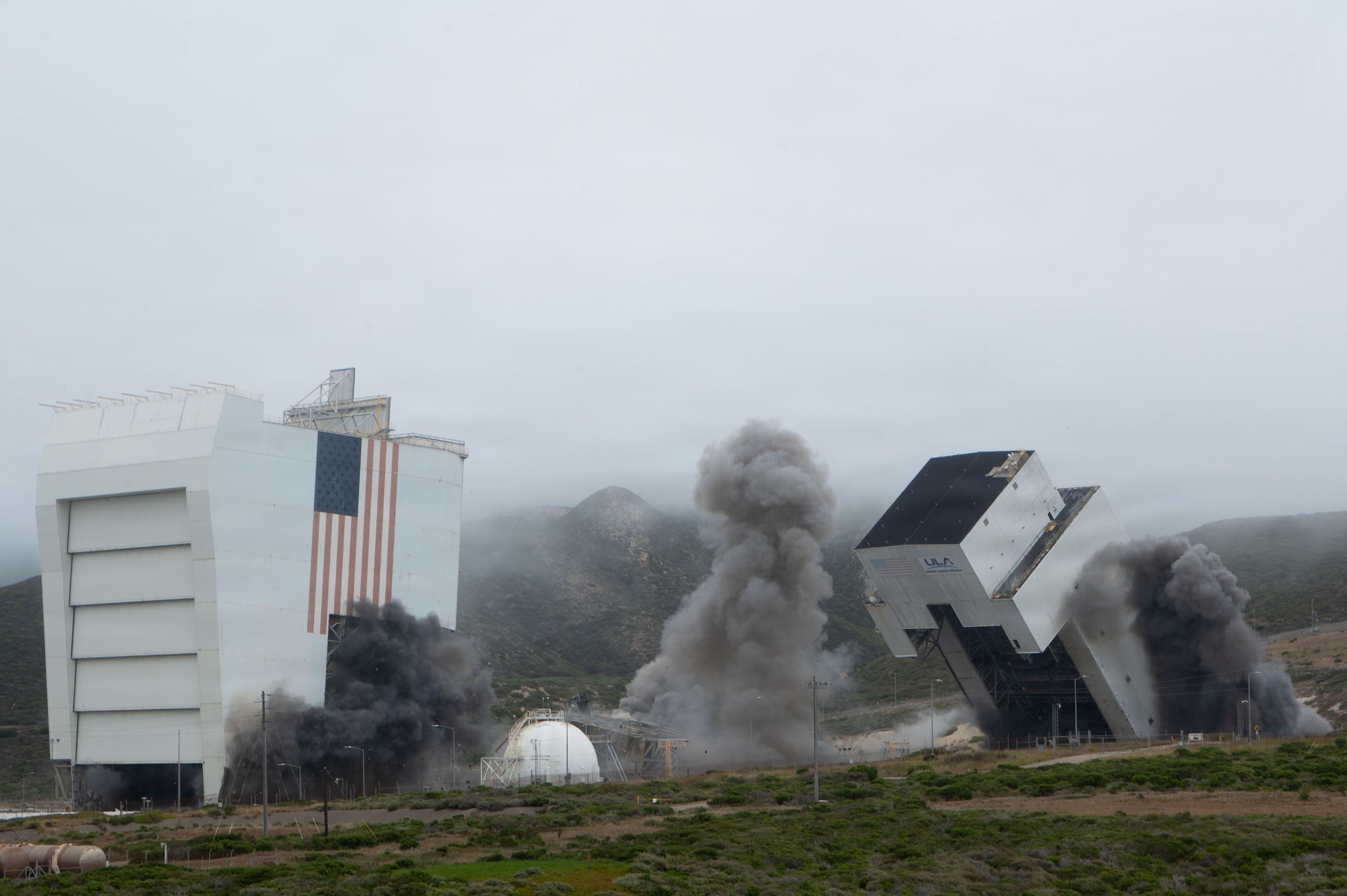 Space Launch Complex 6 collapses during a controlled demolition.