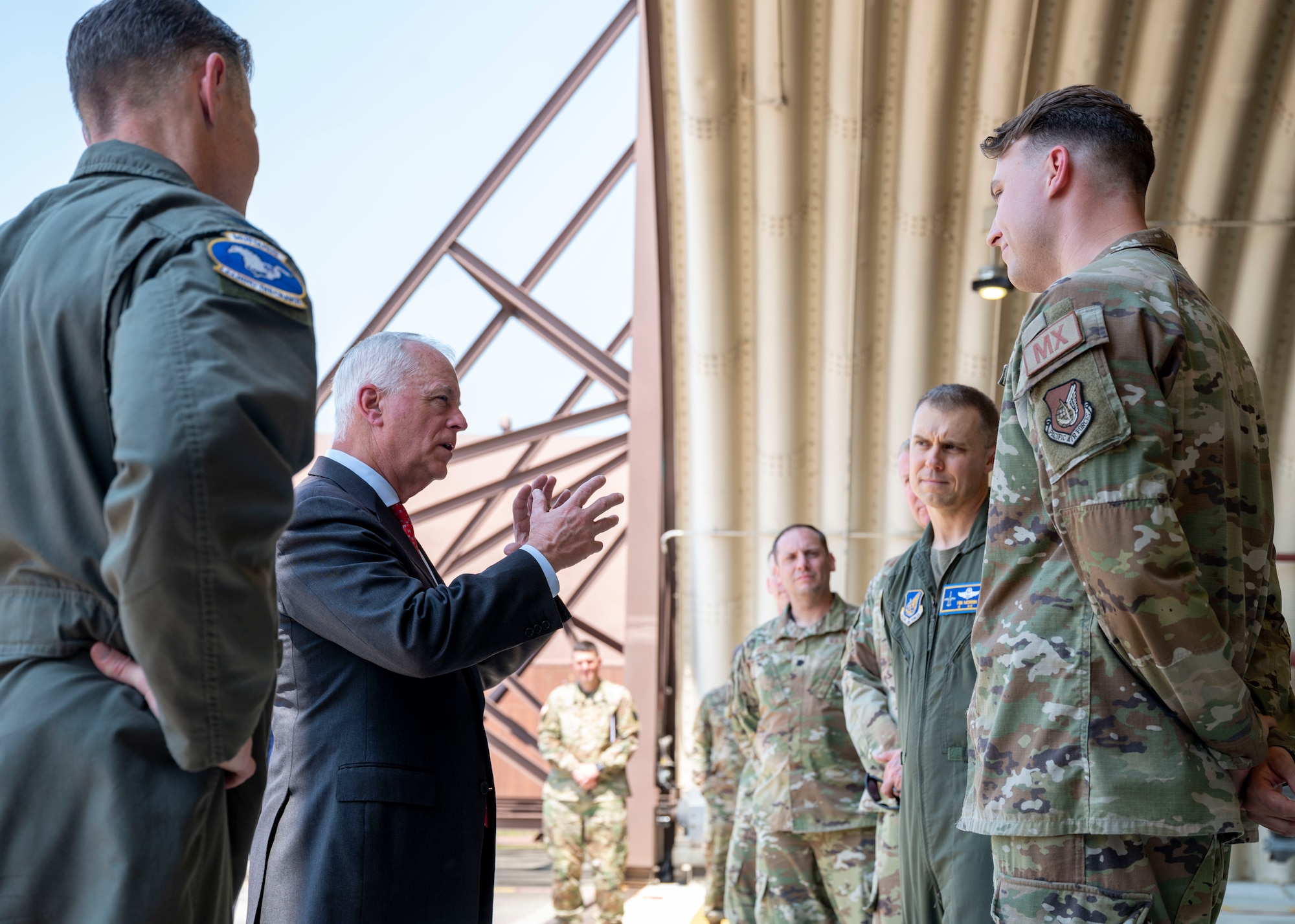 The Under Secretary of War for Personnel and Readiness Anthony J. Tata talks to 51st Operations Group and 51st Maintenance Group members during a visit to Osan Air Base, Republic of Korea, May 14, 2026.