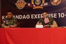 U.S. Marine Corps Col. George J. Flynn, right, commanding officer of Marine Rotational Force – Darwin, I Marine Expeditionary Force, answer a question during a press conference following the KAMANDAG 10 opening ceremony on Fort Bonifacio, Philippines, June 15, 2026.