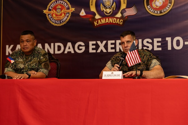 U.S. Marine Corps Col. George J. Flynn, right, commanding officer of Marine Rotational Force – Darwin, I Marine Expeditionary Force, answer a question during a press conference following the KAMANDAG 10 opening ceremony on Fort Bonifacio, Philippines, June 15, 2026.