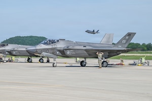 A U.S. Air Force tactical aircraft maintenance specialist assigned to the 33rd Fighter Wing, Florida Air National Guard, marshals an F-35A Lightning II aircraft for launch during Sentry North 2026 at Volk Field Combat Readiness Training Center, Camp Douglas, Wisconsin, June 4, 2026.