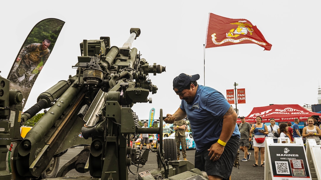 Marines from Recruiting Station Harrisburg and India Battery 3rd Battalion, 14th Marines out of Allentown, Pennsylvania. attended swear in ceremony at Pocono Raceway at Long Pond, Pennsylvania June 14, 2026. New Poolees from all branches had the opportunity to swear in and watch the race. The Pennsylvania Poconos Raceway is where NASCAR races are held in the Northeastern region. (U.S. Marine Corps photo by Sgt. Marcel Gorka)