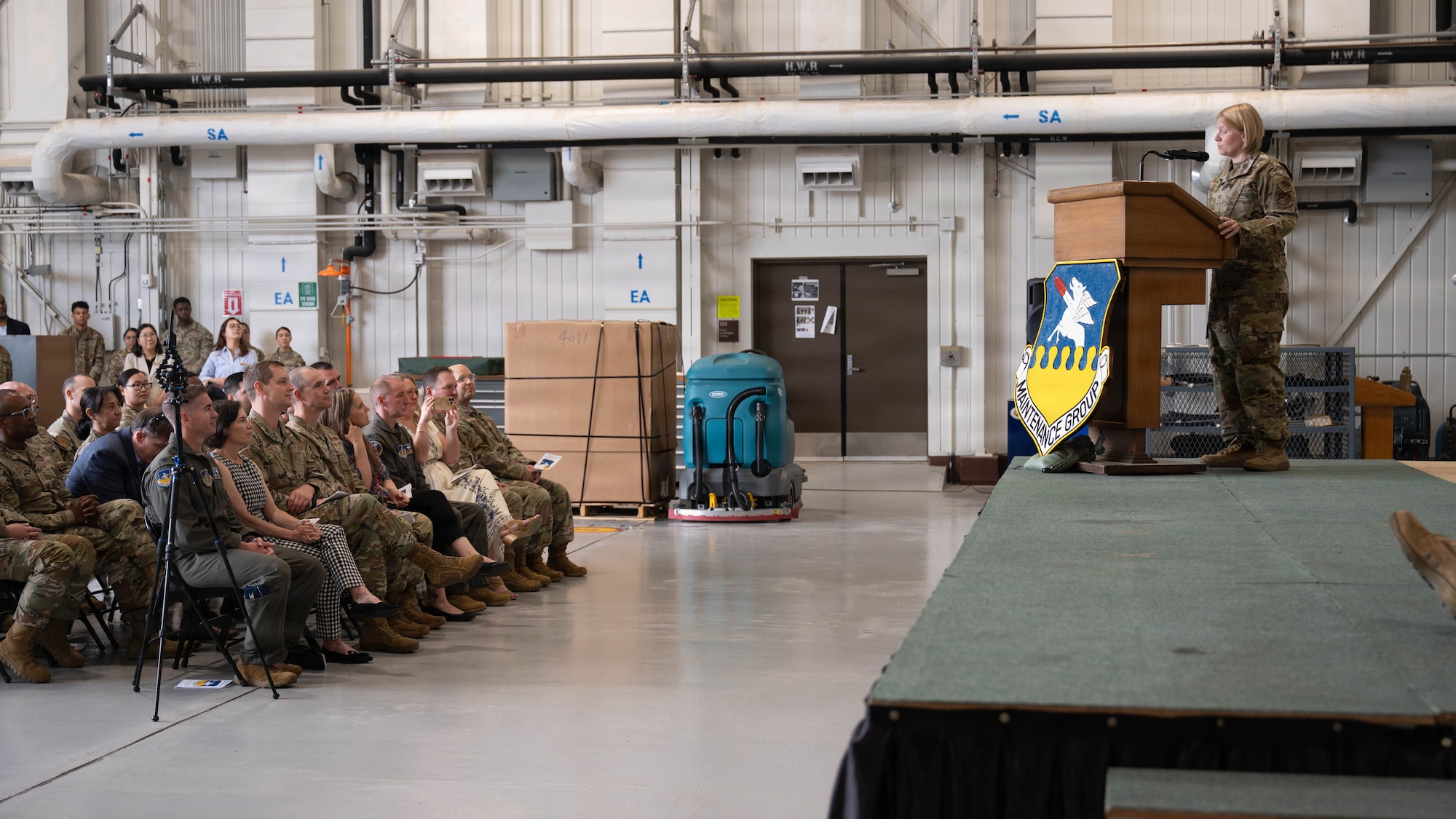 U.S. Air Force Col. Kristen Torma, incoming commander of the 51st Maintenance Group, delivers remarks during a change of command ceremony at Osan Air Base, Republic of Korea, June 8, 2026. The ceremony formally transferred authority and responsibility of the 51st MXG to Torma. (U.S. Air Force photo by Senior Airman Rome Bowermaster)
