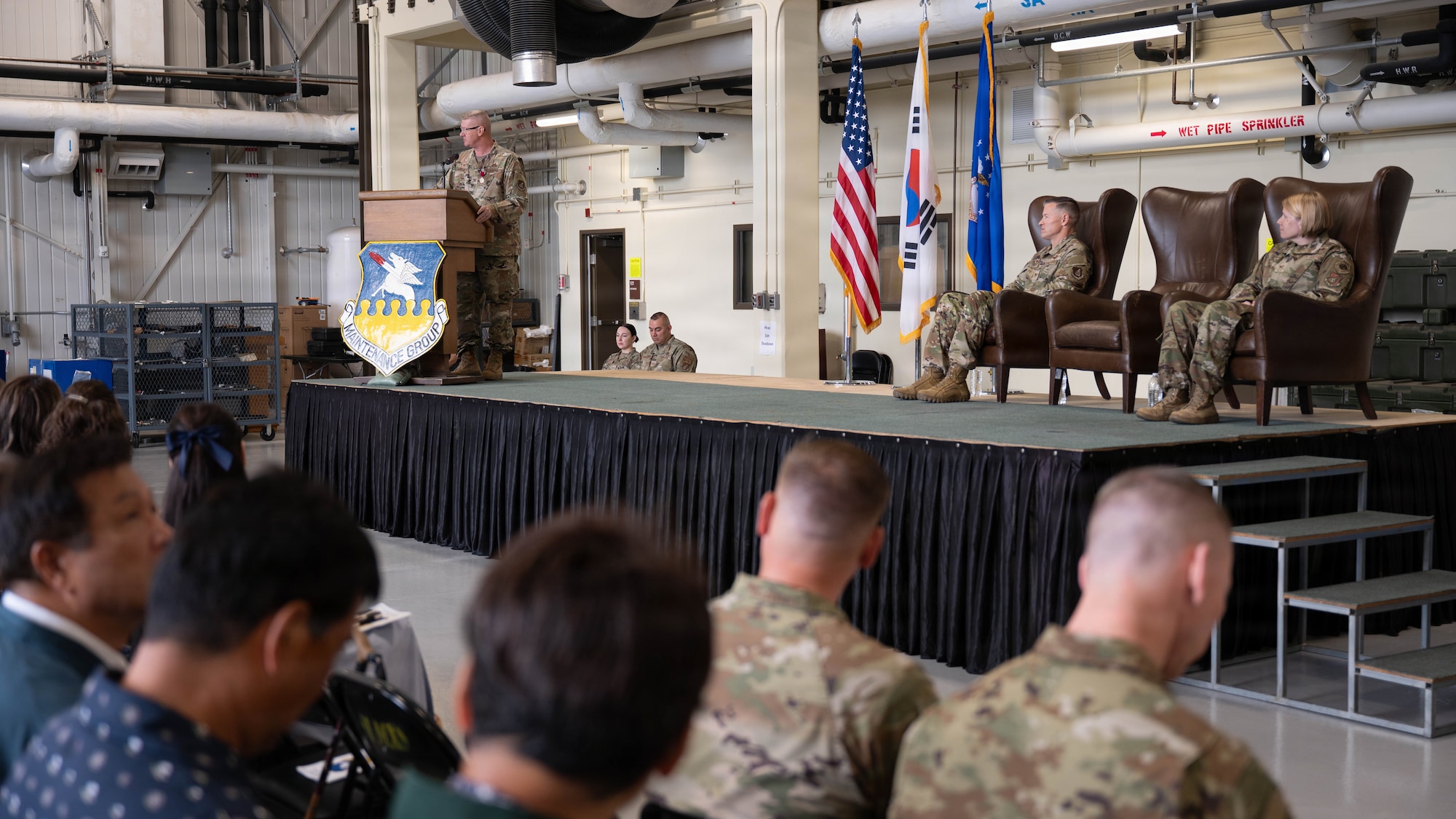 U.S. Air Force Col. Kenneth Beebe, outgoing commander of the 51st Maintenance Group, delivers remarks during a change of command ceremony at Osan Air Base, Republic of Korea, June 8, 2026. The ceremony marked the conclusion of Beebe's time as commander of the 51st MXG. (U.S. Air Force photo by Senior Airman Rome Bowermaster)