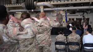 Col. Kenneth Beebe, outgoing commander of the 51st Maintenance Group, renders his final salute to members of the 51st MXG during a change of command ceremony at Osan Air Base, Republic of Korea, June 8, 2026. The final salute recognizes the outgoing commander's service and marks the conclusion of their leadership of the 51st MXG. (U.S. Air Force photo by Senior Airman Rome Bowermaster)