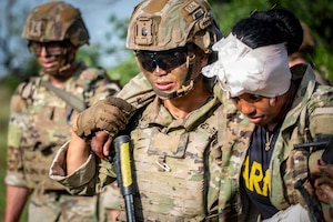 U.S. Army Sgt. Kyaw Eh an infantryman with 1st Infantry Division, III Armored Corps, carries a notional casualty during the medical trauma evacuation lane at the IIIAC Best Squad Competition on June 3, 2026 at Fort Hood, Texas. The Army Best Squad Competition brings together top-performing Soldiers to compete in a series of demanding events designed to assess tactical competence, leadership, fitness, and squad cohesion. (U.S. Army photo by Sgt. 1st Class Thomas Calvert)