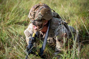 U.S. Army Spc. William Parker, an infantryman with 1st Infantry Division, III Armored Corps, calls out direction of incoming fire during the medical trauma evacuation lane at the IIIAC Best Squad Competition on June 3, 2026 at Fort Hood, Texas. The Army Best Squad Competition brings together top-performing Soldiers to compete in a series of demanding events designed to assess tactical competence, leadership, fitness, and squad cohesion. (U.S. Army photo by Sgt. 1st Class Thomas Calvert)