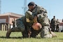 U.S. Marines with 2nd Network Battalion, Marine Corps Cyberspace Operations Group, Marine Corps Forces Cyberspace Command, grapple during 2nd Network Battalion’s 5th birthday celebration at Marine Corps Base Camp Lejeune, North Carolina, June 4, 2026. 2nd Network Battalion was activated on June 3, 2021, to ensure the operation of a resilient network that enables mission execution in the face of persistent cyber threats. (U.S. Marine Corps photo by Cpl Daniela Chicas Torres)