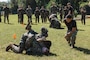 U.S. Marines with 2nd Network Battalion, Marine Corps Cyberspace Operations Group, Marine Corps Forces Cyberspace Command, grapple during 2nd Network Battalion’s 5th birthday celebration at Marine Corps Base Camp Lejeune, North Carolina, June 4, 2026. 2nd Network Battalion was activated on June 3, 2021, to ensure the operation of a resilient network that enables mission execution in the face of persistent cyber threats. (U.S. Marine Corps photo by Cpl Daniela Chicas Torres)