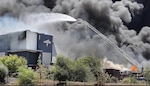 DLA San Joaquin firefighters battling a fire.