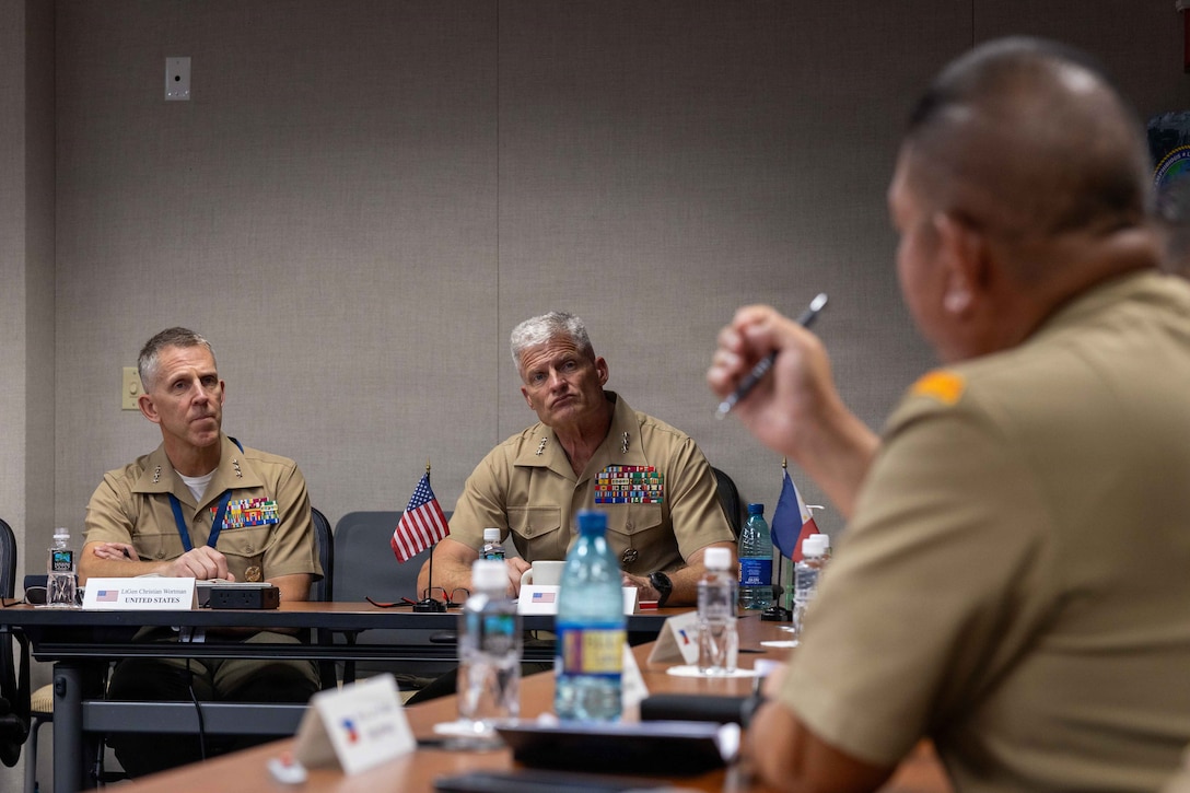 U.S. Marine Corps Lt. Gen. Christian Wortman, left, the commanding general of I Marine Expeditionary Force, and U.S. Marine Corps Lt. Gen. Roger Turner, center, the commanding general of III Marine Expeditionary Force, listen to Philippine Marine Corps Brig. Gen. Larry Batalla, 1st Marine Brigade commander, give remarks during a key leader engagement at the Pacific Amphibious Leaders Symposium 2026 in Honolulu, Hawaii, June 16, 2026. Bringing together experts and leaders from across the Indo-Pacific, PALS fosters collaboration among allied and partner amphibious and maritime forces to share knowledge and recent operational insights. This year was the 12th iteration of the symposium and hosted senior leaders from 25 participating nations who are committed to a free and open Indo-Pacific, with the objective of strengthening and developing regional relationships. (U.S. Marine Corps photo by Lance Cpl. Mayte Ramirez Lopez)