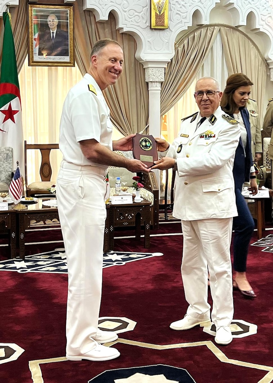 Adm. George M. Wikoff, left, commander of U.S. Naval Forces Africa, presents Maj. Gen. Mahfoud Benmeddah, the commander of the Algerian Naval Forces, with a plaque during a meeting in Algiers, June 9. The visit underscores the strong shared security interests between the United States and Algeria, highlighting opportunities to expand maritime collaboration in the region. (U.S. Navy courtesy photo)