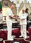 Adm. George M. Wikoff, left, commander of U.S. Naval Forces Africa, presents Maj. Gen. Mahfoud Benmeddah, the commander of the Algerian Naval Forces, with a plaque during a meeting in Algiers, June 9. The visit underscores the strong shared security interests between the United States and Algeria, highlighting opportunities to expand maritime collaboration in the region. (U.S. Navy courtesy photo)