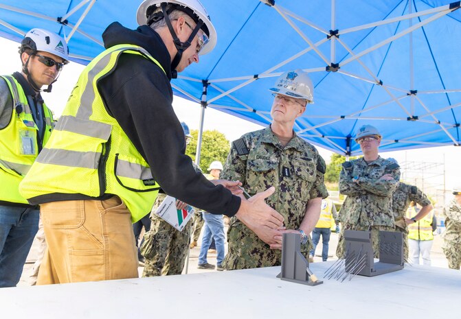 Chief of Naval Operations Adm. Daryl Caudle is briefed on recent Dry Dock 4 seismic upgrades by Naval Facilities Engineering Systems Command Northwest employees June 3, 2026, during his command visit to Puget Sound Naval Shipyard & Intermediate Maintenance Facility, in Bremerton, Washington. (U.S. Navy photo by Wendy Hallmark)