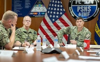Chief of Naval Operations Adm. Daryl Caudle meets with Capt. JD Crinklaw, commander, Puget Sound Naval Shipyard & Intermediate Maintenance Facility, and senior leadership during his command visit, June 3, 2026, in Bremerton, Washington. The team discussed several key initiatives during the visit. (U.S. Navy photo by Wendy Hallmark)