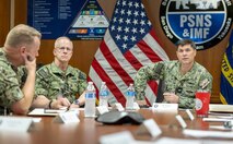 Chief of Naval Operations Adm. Daryl Caudle meets with Capt. JD Crinklaw, commander, Puget Sound Naval Shipyard & Intermediate Maintenance Facility, and senior leadership during his command visit, June 3, 2026, in Bremerton, Washington. The team discussed several key initiatives during the visit. (U.S. Navy photo by Wendy Hallmark)